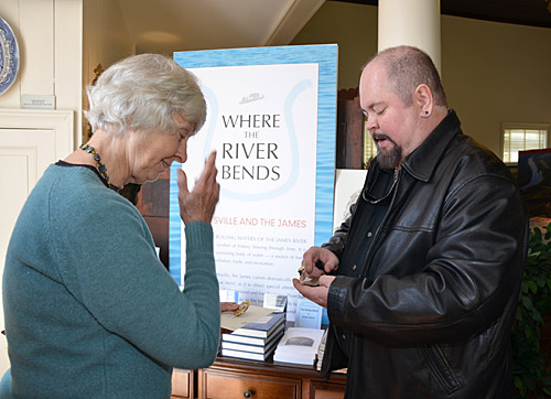 Matthew Thacker shows Evelyn Edson his father's Mayor badge