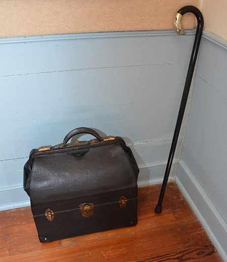 Raymon Thacker 's undertaker bag and cane